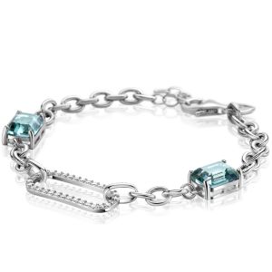 ZINZI zilveren fantasie schakel armband met ovale schakel, bezet met witte zirconia's en twee groenachtig blauwe (petrol) kleurstenen in vierpootszetting 18-21cm ZIA2487